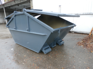 Aschemulde mit Einwurfschacht und Bockrollen